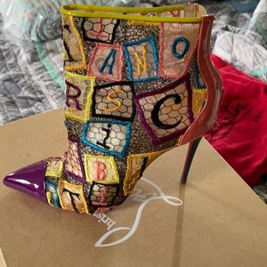 Christian Louboutin, size 10